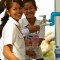 Girls at Preah Bat Soramarith high school fill up their water bottles